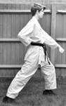 A picture containing person, building, outdoor, fence

Description automatically generated