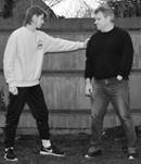 A person pointing at another person

Description automatically generated with low confidence