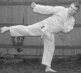 A person in a karate uniform

Description automatically generated with low confidence
