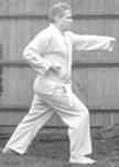 A person in a karate uniform

Description automatically generated with medium confidence