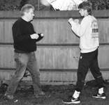 A picture containing person, outdoor, sport, standing

Description automatically generated