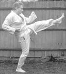 A person in a karate uniform

Description automatically generated with low confidence