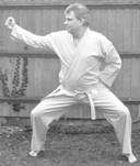 A person in a karate uniform

Description automatically generated with low confidence