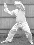 A person in a karate uniform

Description automatically generated with low confidence