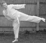 A picture containing building, person, outdoor, person

Description automatically generated