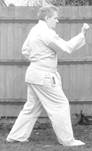 A person in a karate uniform

Description automatically generated with low confidence