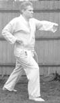 A person in a karate uniform

Description automatically generated with medium confidence