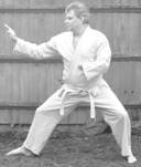 A person in a karate uniform

Description automatically generated with medium confidence