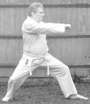 A person in a karate uniform

Description automatically generated with low confidence