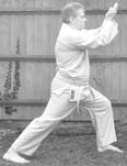 A person in a karate uniform

Description automatically generated with low confidence