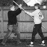 A couple of men playing baseball

Description automatically generated with medium confidence