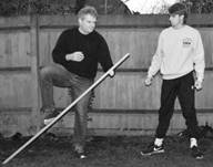 A picture containing grass, person, outdoor, player

Description automatically generated